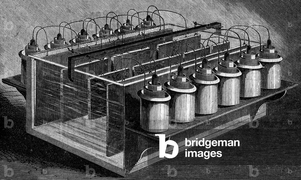 Electrotyping workshops, 1860: bathing. Wooden tank filled with gutta percha and filled with copper sulfate from which voltaic batteries are placed. Mr. Koblenz's workshops in Paris. Engraving in “” Le Monde Illustré”” n°143 of 7 January 1860.