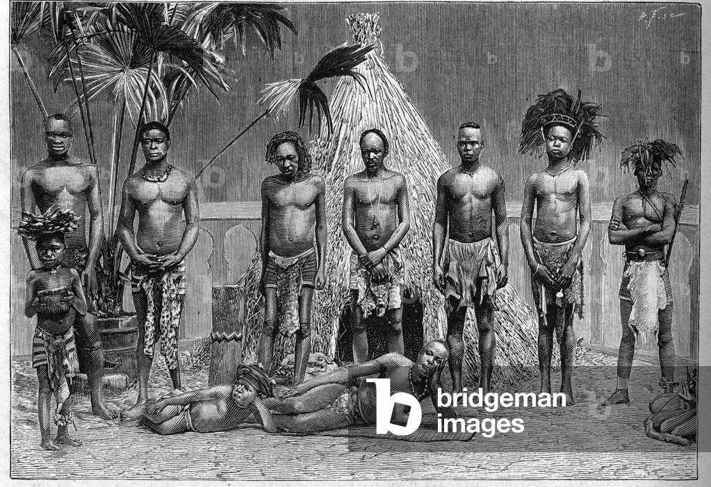 Group of men of the Angolan troupe exhibited in Paris during the World Exposition of 1889 (engraving)