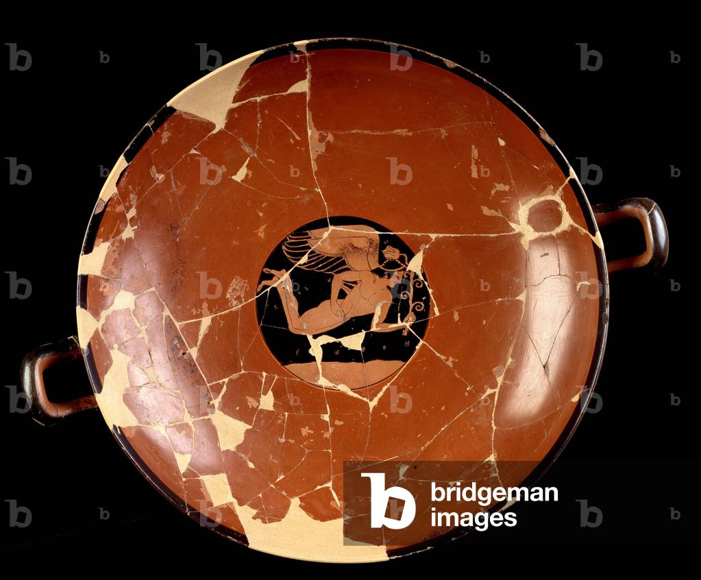 Attic cup with red figures signed by the potter Kachrylion representing a Greek heros as a handsome young man wing, 510 BC