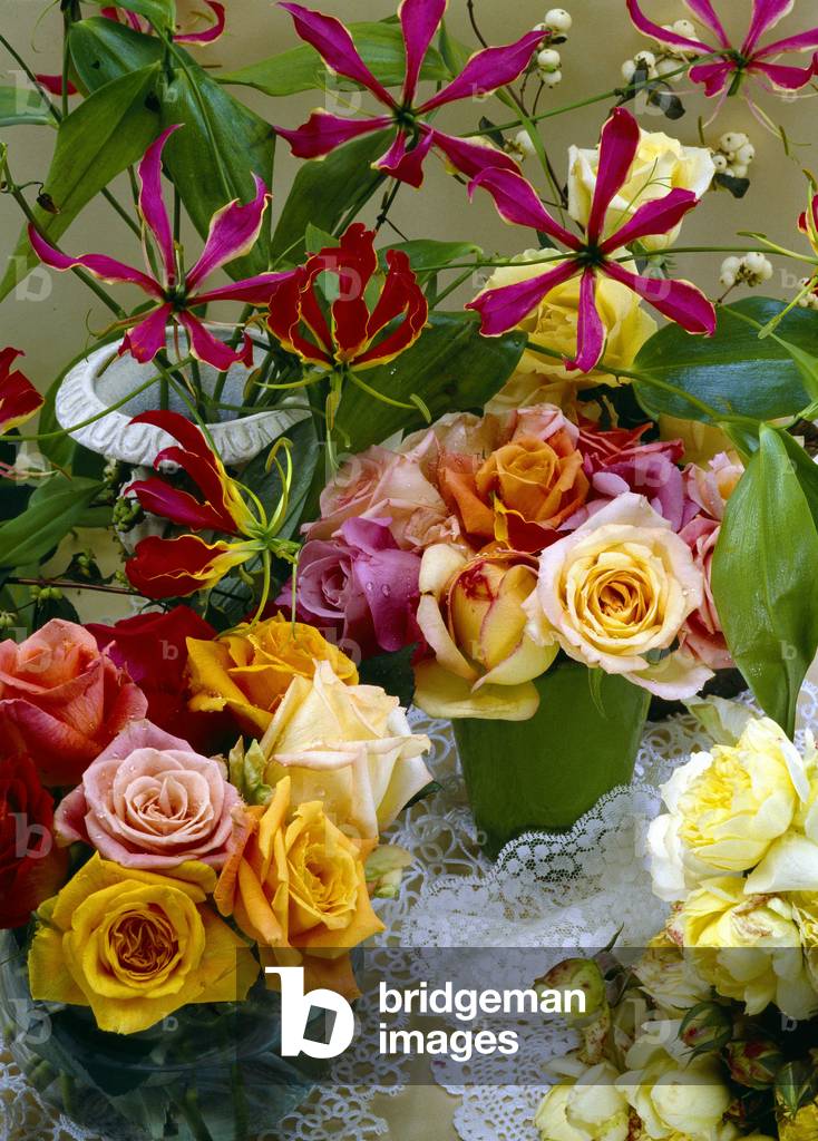 Still life of a floral composition with two bouquets of roses.