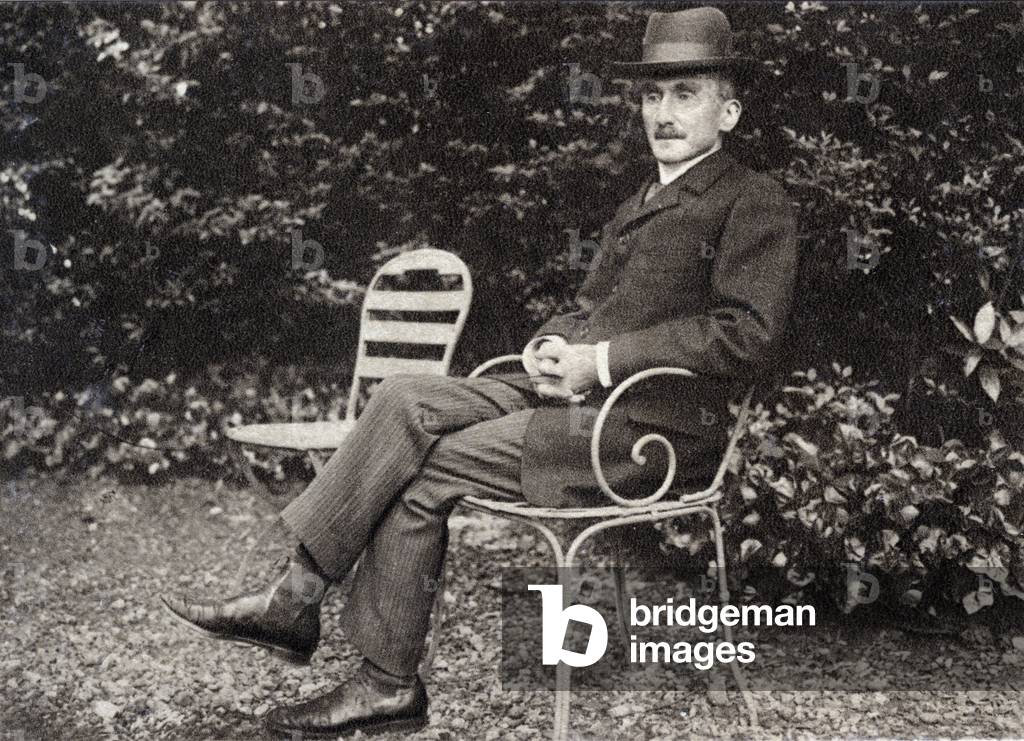 Henri Bergson, French philosopher, in his garden, 1905 (photo)