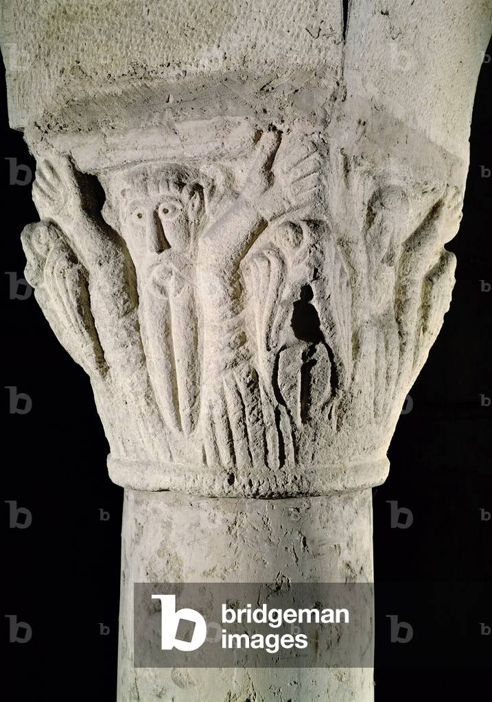 Column capital with a man with raised arms (stone)