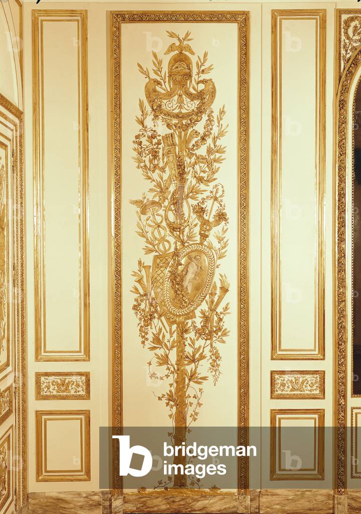 Panelling detail with a trophy shield, lyre, sceptre and caduceus for the 'Salon de Compagnie' of the Hotel d'Uzes in Paris, made by Jean Baptiste Boiston and Joseph Metivier, c.1768 (gilded wood)