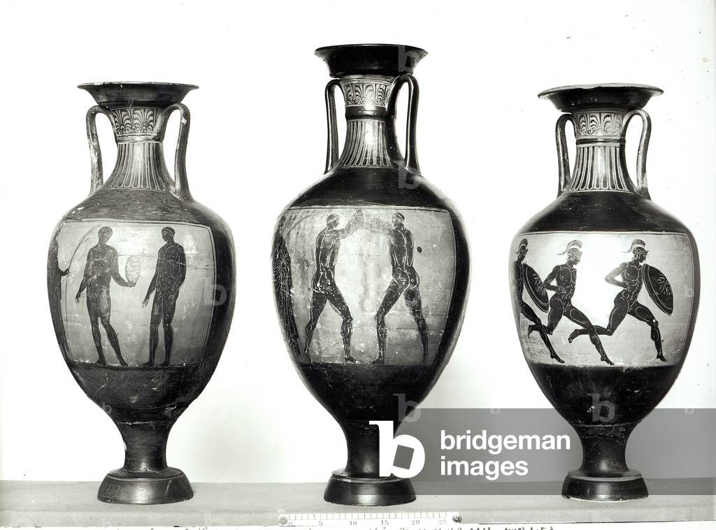 Three Panathenaic amphorae depicting an athlete receiving a trophy, Boxers and Athletes, 580-520 BC (ceramic) (b/w photo)