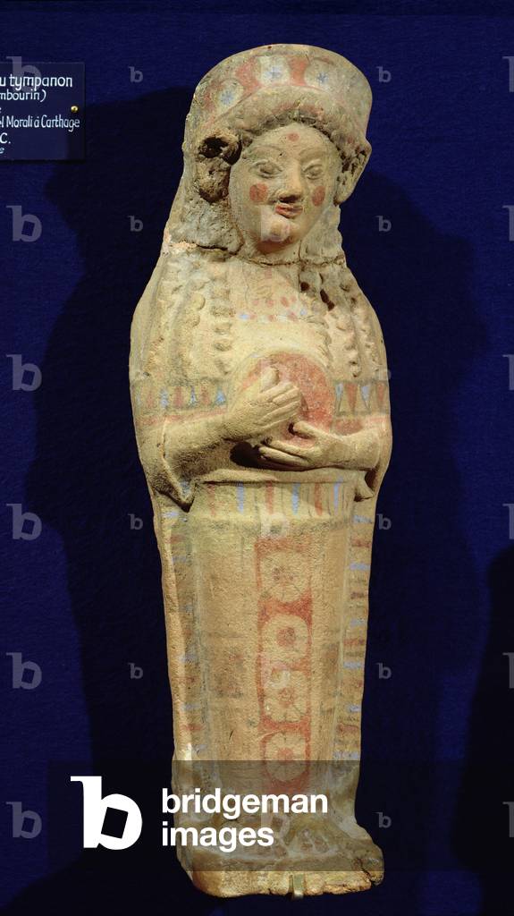 Statuette of a musician (polychrome stone)