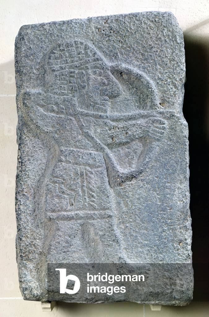 Orthostat depicting an archer from the Palace of Kapara, King of Guzama, Tell Halaf, Syria (basalt)