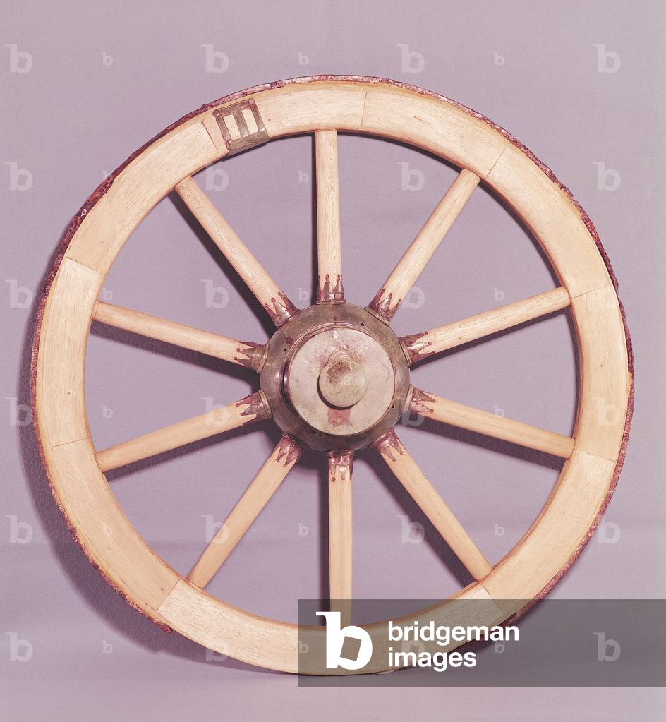Reconstruction of a wheel from a chariot found at the tomb of a Princess of Vix (wood and gold)