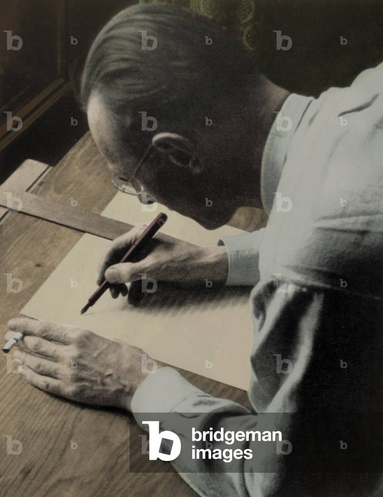 Carl Orff composing in