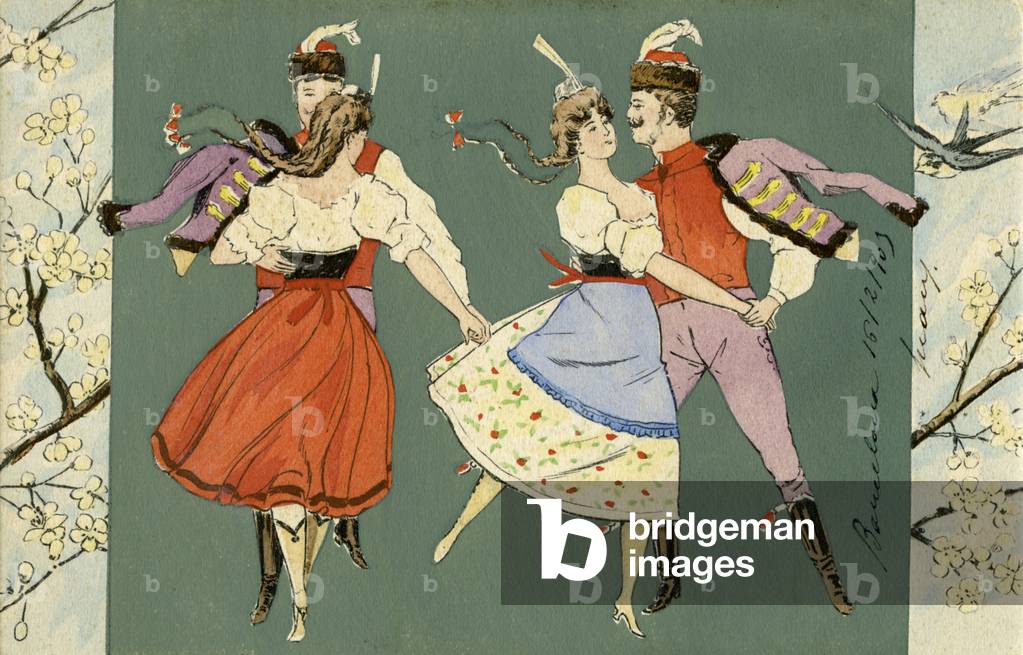 Couples performing traditional Hungarian dance