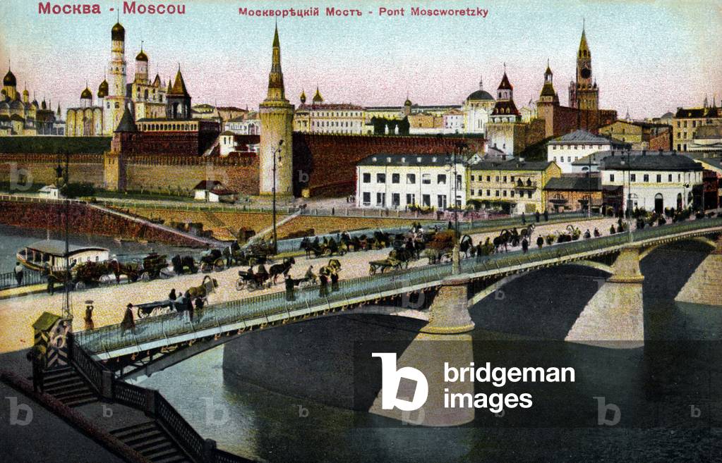 Moscow - view of the Russian city over looking a bridge with horse and carts.