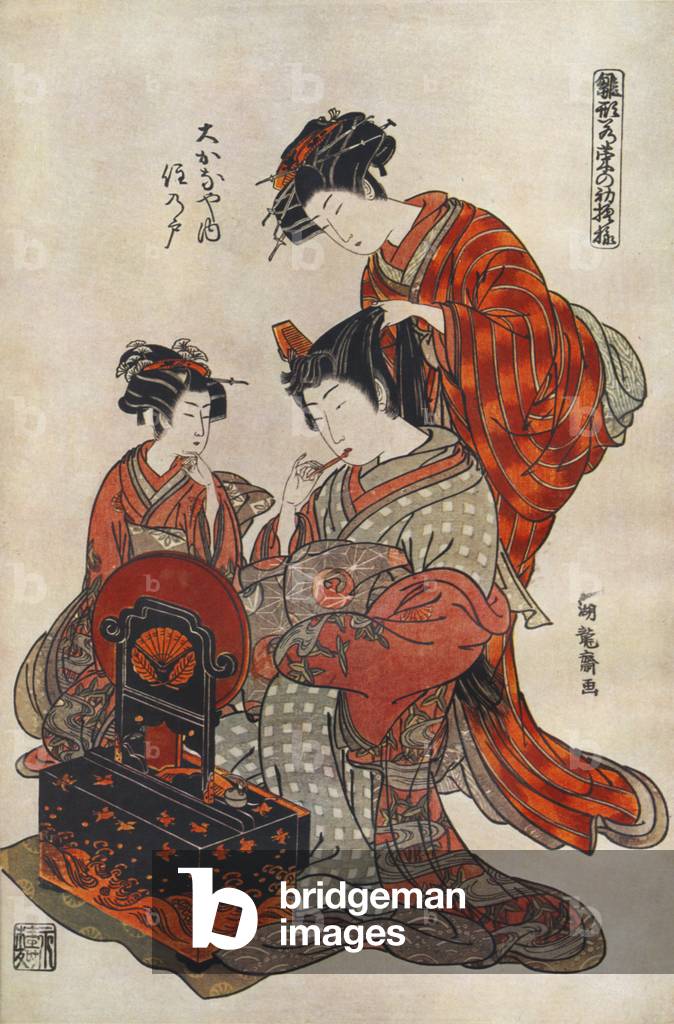 Courtesan in kimono being