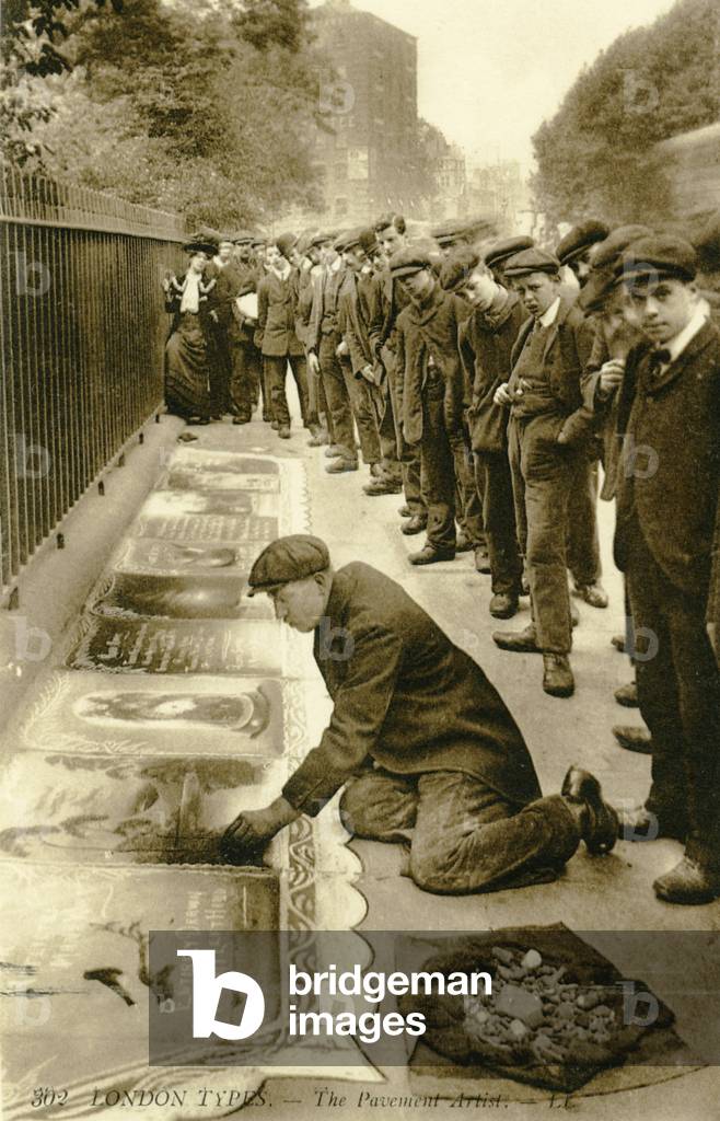 A pavement artist at work, London