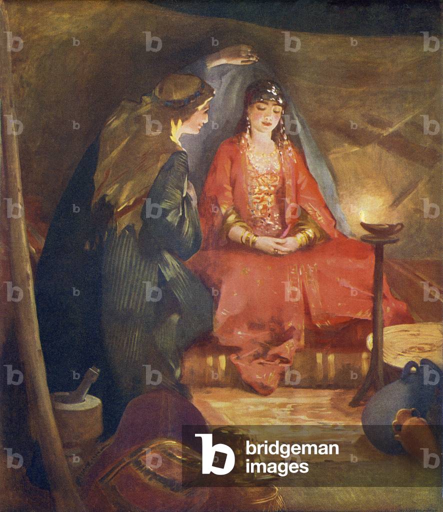 Bridegroom lifts the veil of the bride