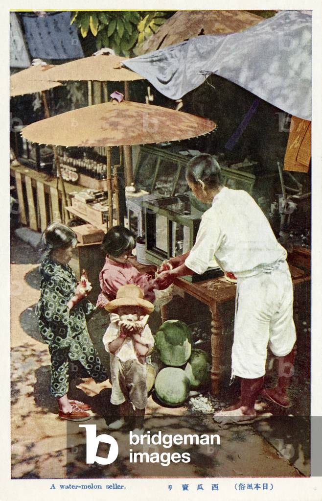 Japanese trader selling watermelons to children