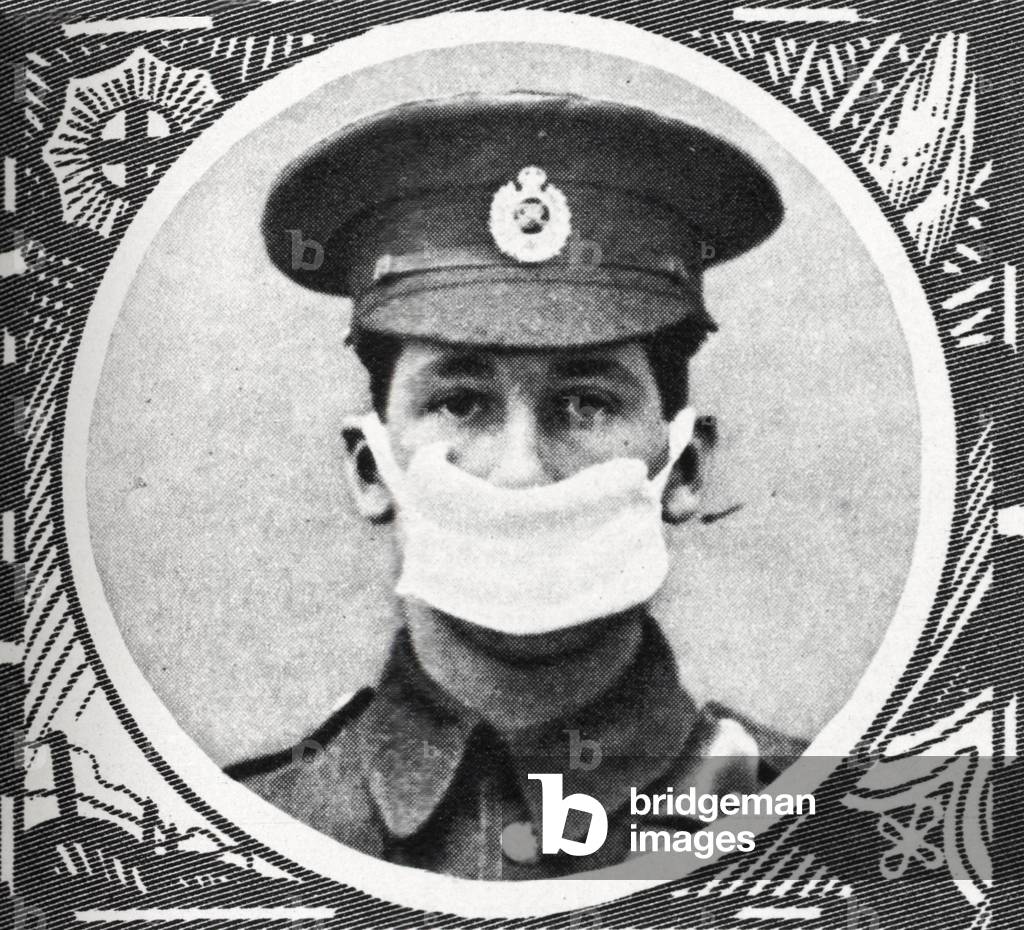 World War One -Man wearing a cotton pad respirator, 1915