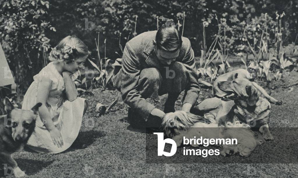 George VI and Princess Margaret with family dogs