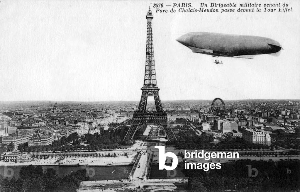 Military airship flying near Eiffel Tower, Paris