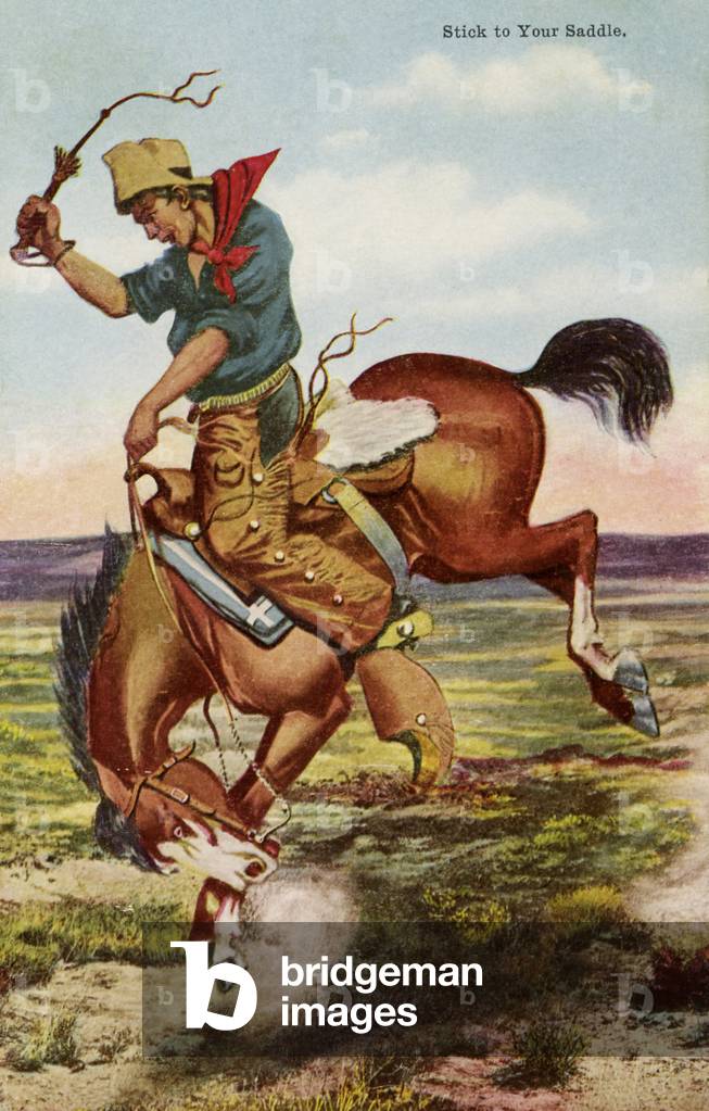 Cowboy on bucking horse