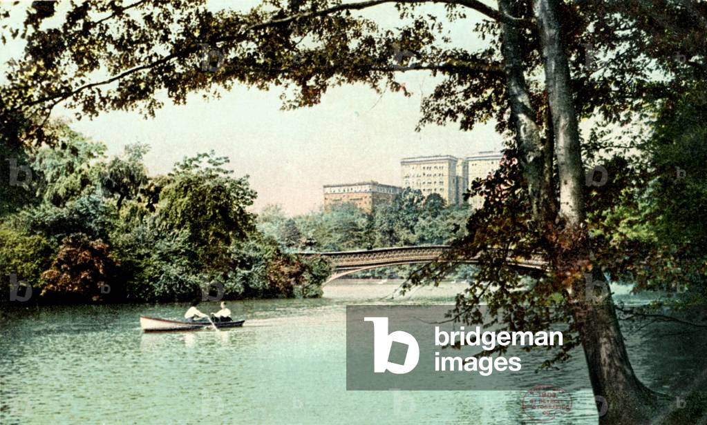 New York City, USA: the lake and Bow Bridge in Central Park.