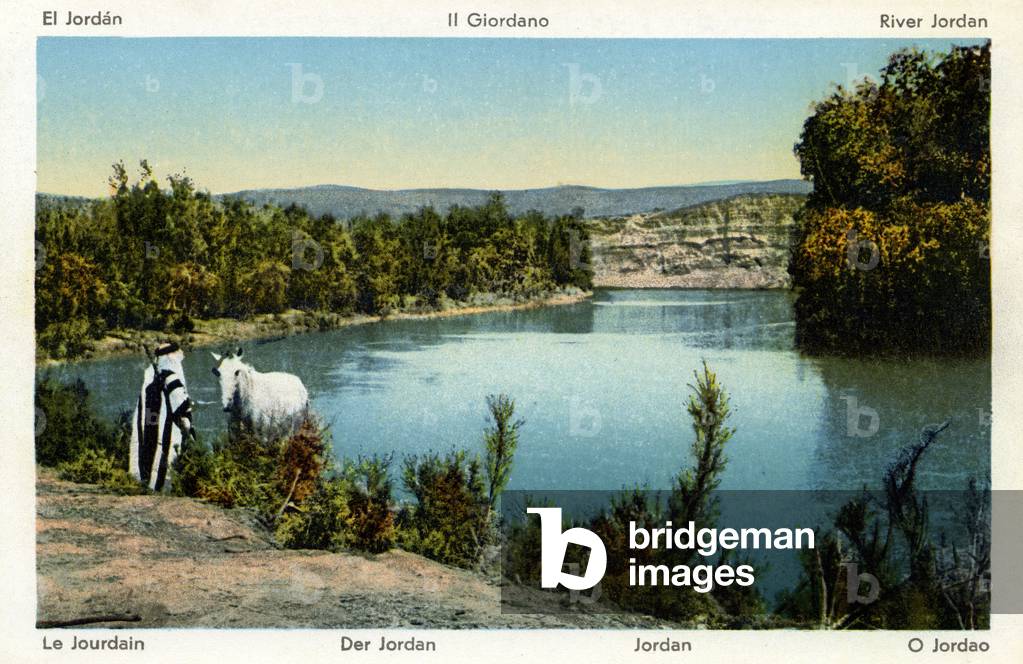 Jordan river - Bedouin watering his white horse