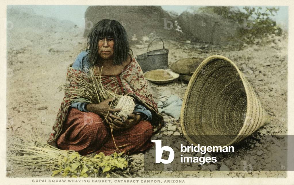 Supai woman weaving a basket, Arizona