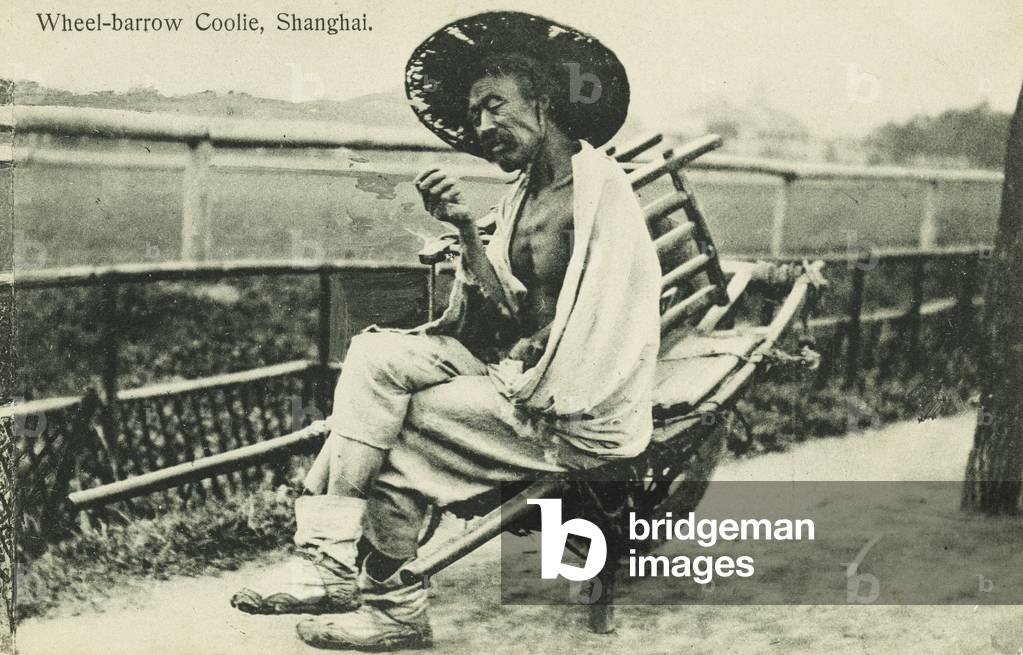 Labourer with wheelbarrow