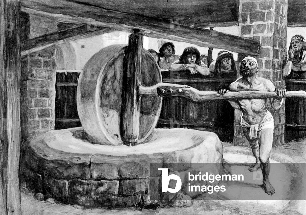 Samson turns the mill in prison, by  Tissot -Bible