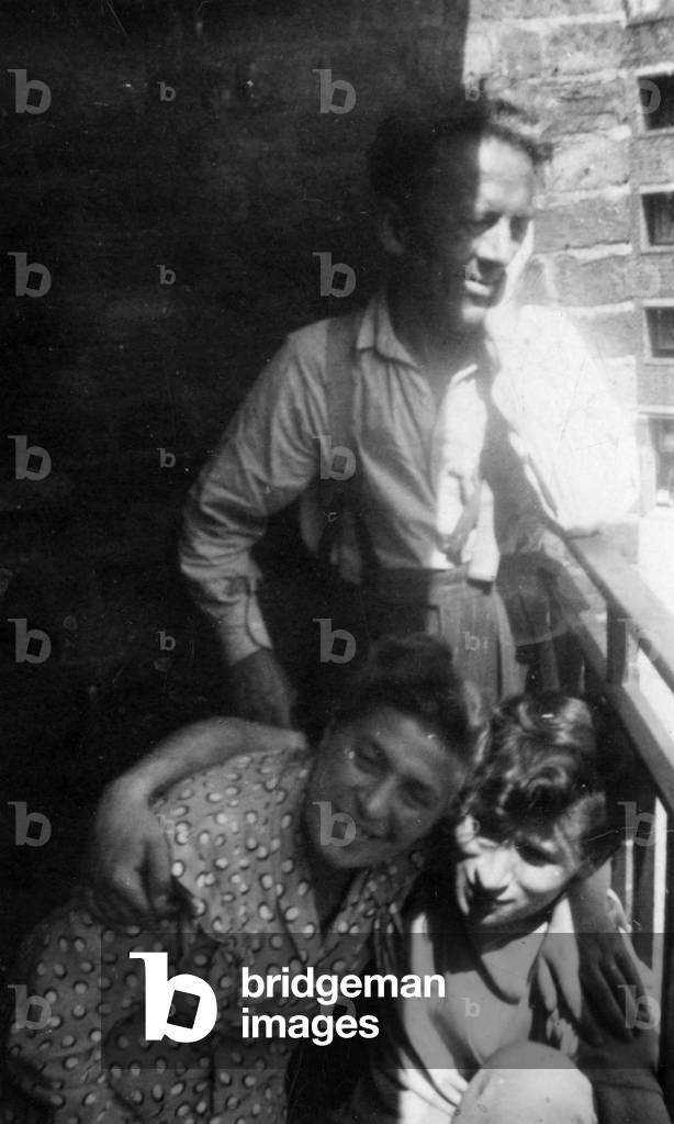 Arnold Wesker as a young boy with his parents on the balcony of their fla in upper Clapton, London