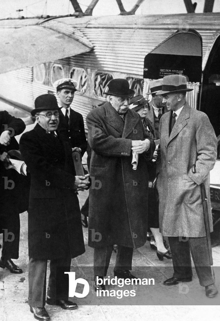 ELGAR, with Carice, at Croydon Airfield, 1933 autographing records, just before setting off for Paris