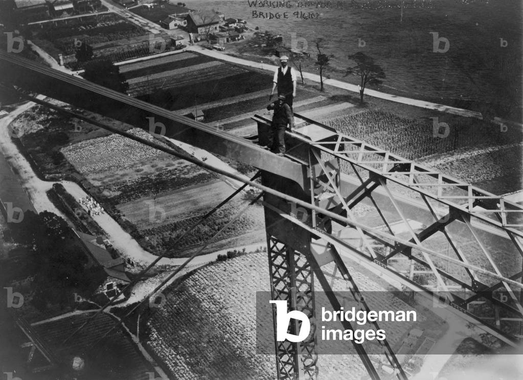 Working on top of Blackwell's Island bridge, 1907 (b/w photo)