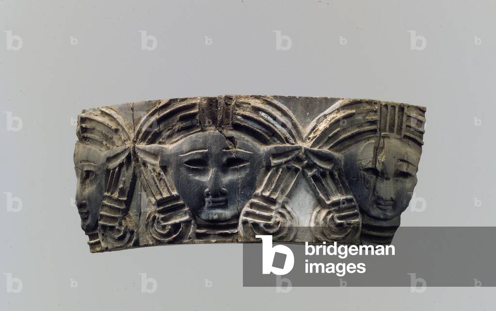 Cloisonné furniture or cosmetic box plaque with three frontal heads, c.8th–7th century B.C. (ivory)