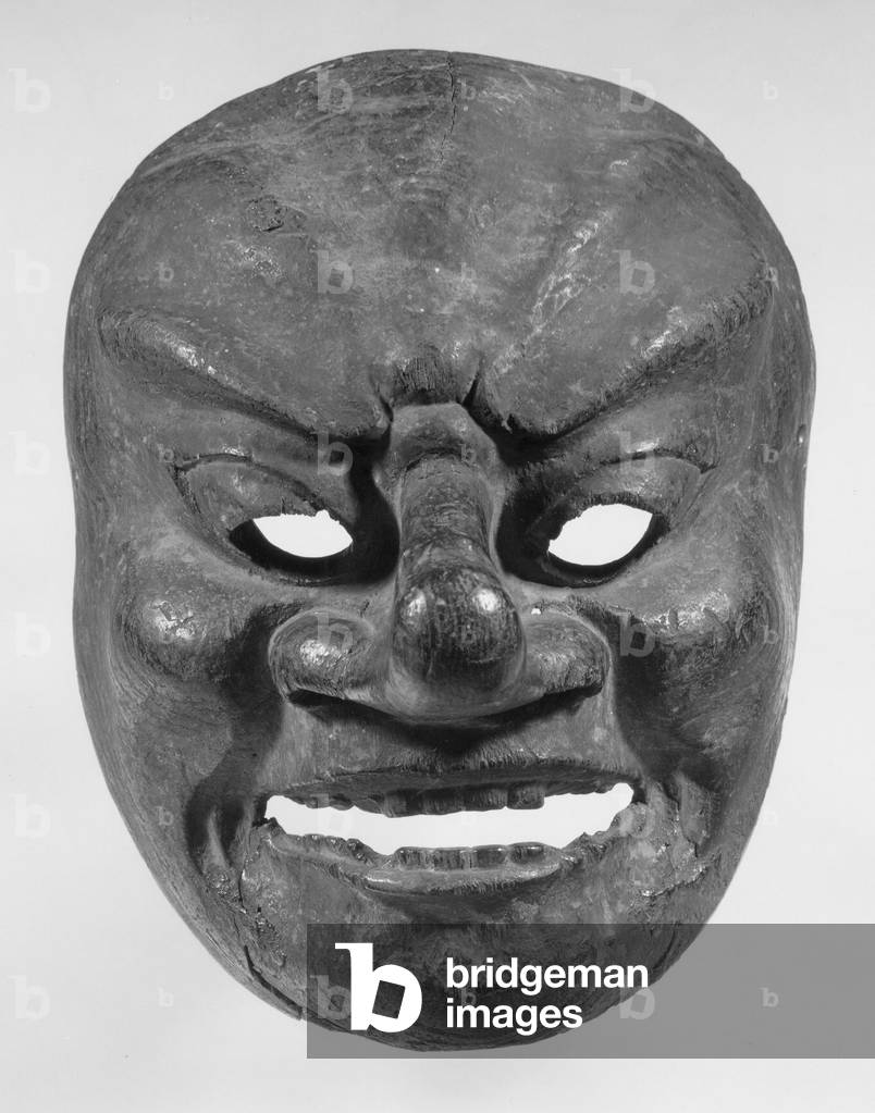 Bugaku Mask (wood with remains of red and black pigments)