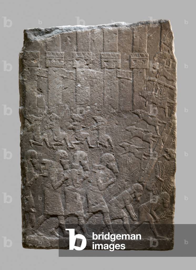 Battle scene of Assyrians storming a citadel, c.704–681 B.C. (gypsum alabaster)