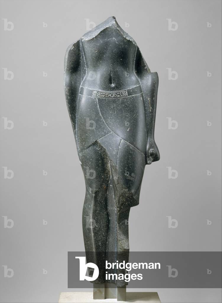 Torso of a Ptolemaic King, inscribed with cartouches of a late Ptolemy, 80-30 BC (basalt)