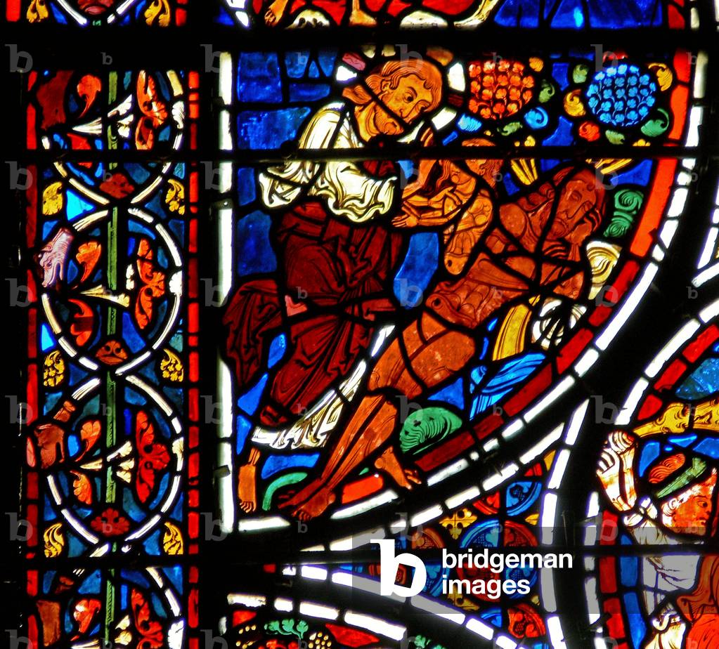 Detail from a window depicting the parable of the Good Samaritan: The creation of Eve (stained glass)