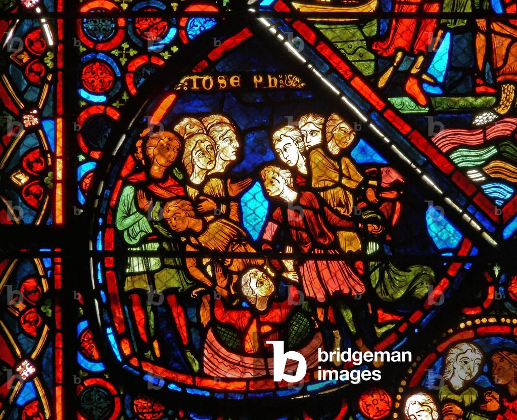 Detail from a window depicting scenes from the story of Joseph (stained glass)
