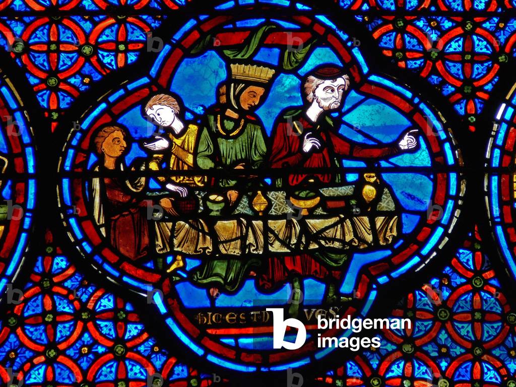 Detail from a window depicting the parable of Lazarus and Dives (stained glass)