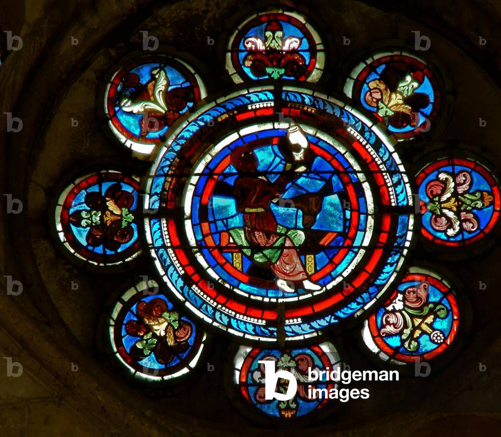 Detail from the north rose window depicting Medicine from the Liberal Arts (stained glass)