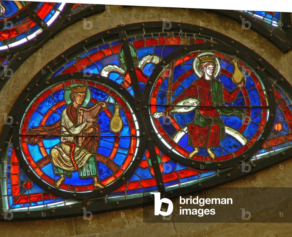 Detail from the east rose window depicting two elders of the apocalypse (stained glass)