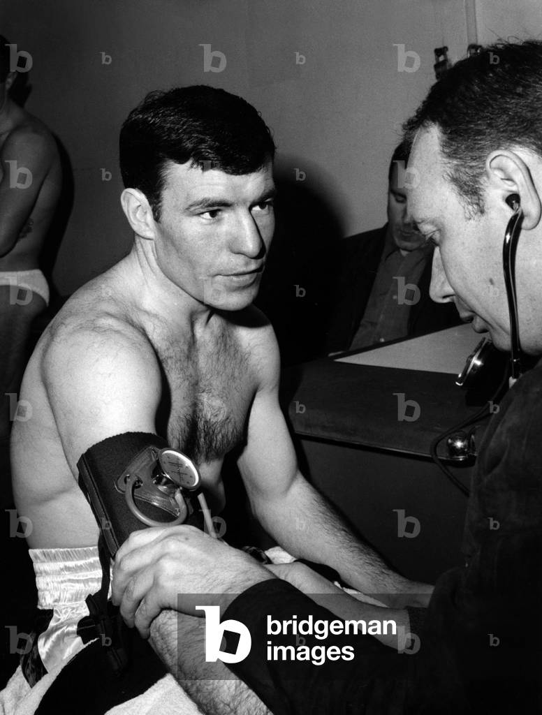 Boxer Brian Curvis At Midi Weighing A Medicin Takes Tension April 25, 1966 At the Palais des Sports (b/w photo)
