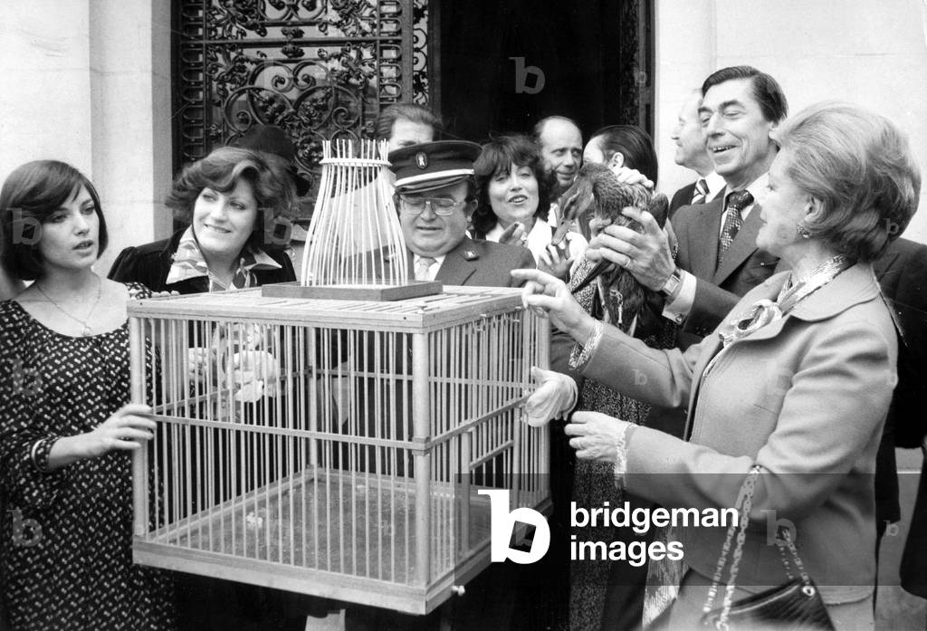 French Restaurateur Claude Terrail Celebrating The 500000Th Duck Served in his Restaurant The Silver Tower (La Tour D' Argent) in Paris, here With Countess Bedford and Actress Nicole Kalfan March 17, 1976  (b/w photo)
