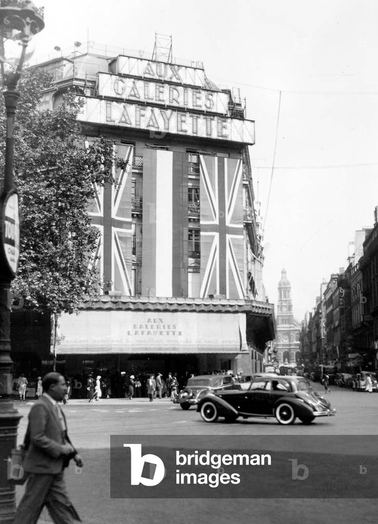 La Fayette Department Store in Paris With English and French Flags, 1939 (b/w photo)