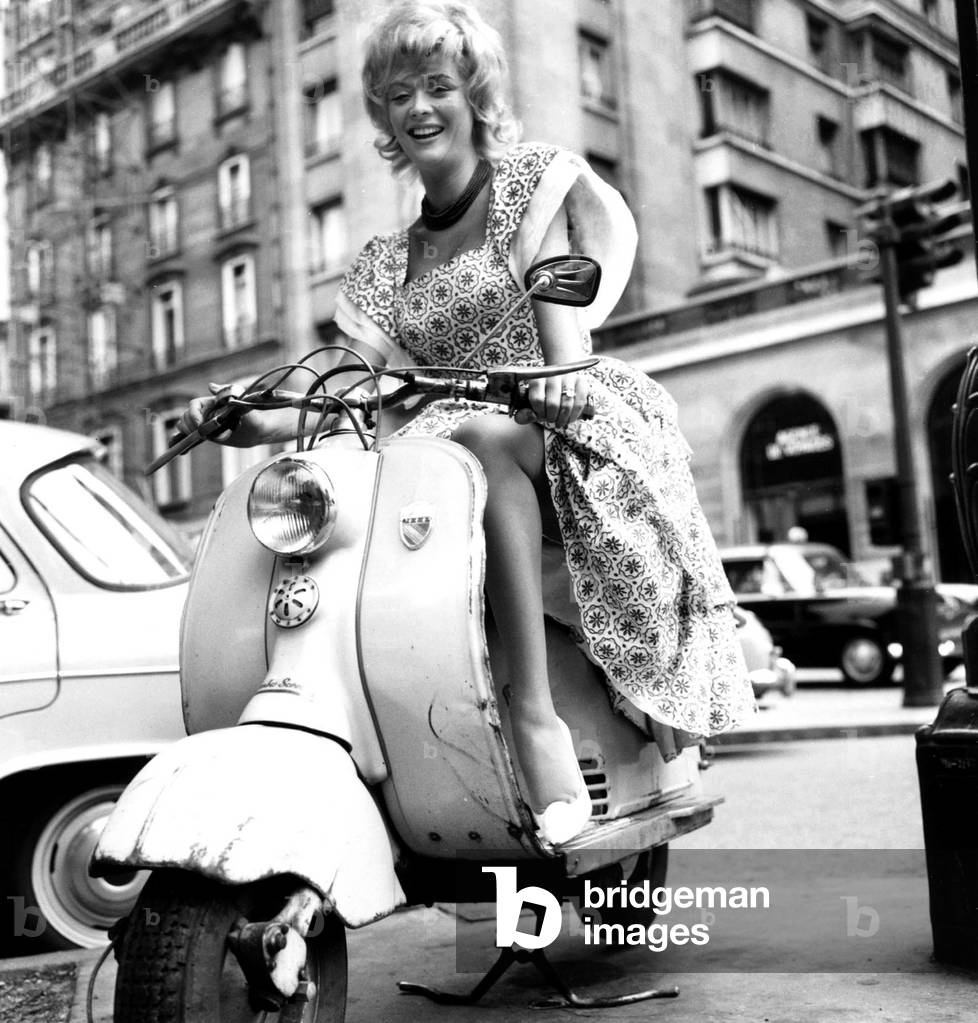 Monique Van Vooren on A Scooter in Paris on June 24, 1960 (b/w photo)