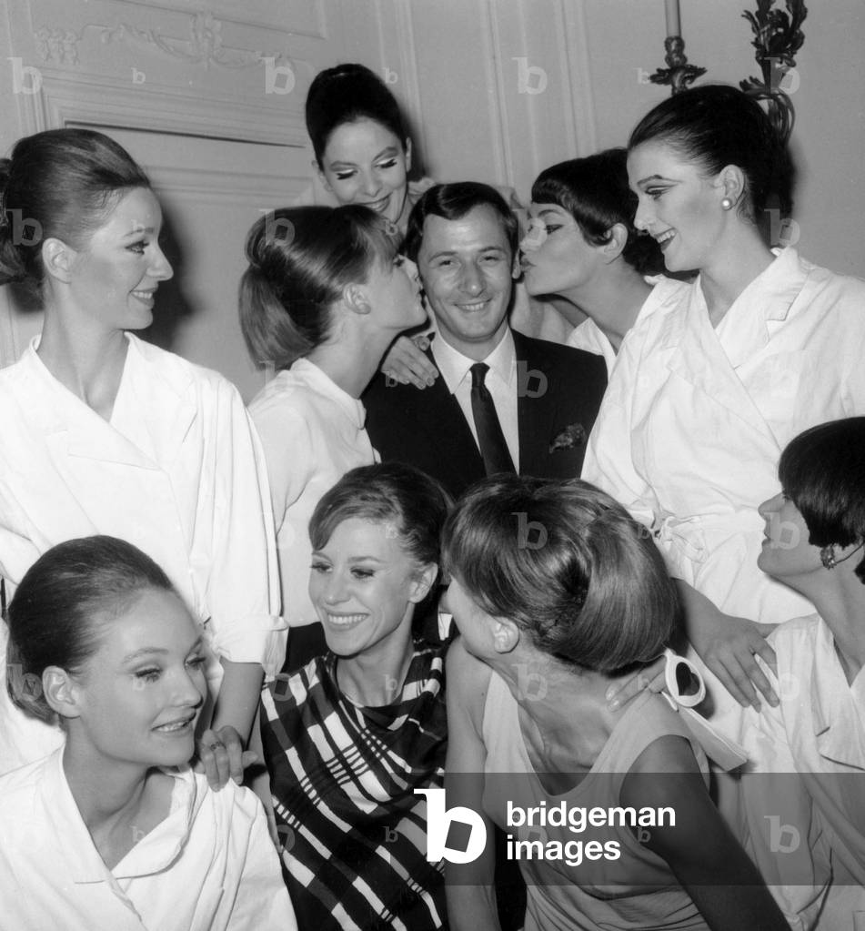 Marc Bohan (Dressdesigner For Dior) Kissed By his Models After The Showing of Dior Collection on July 29, 1965 (b/w photo)