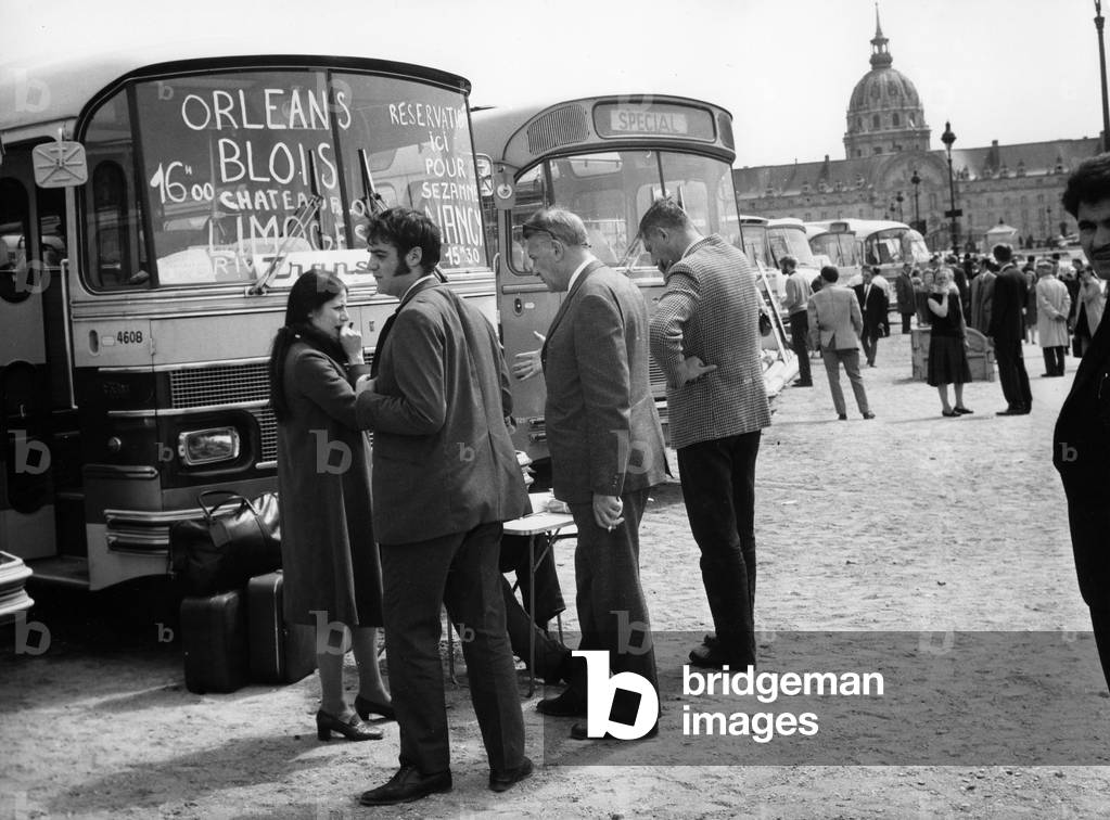 L'Esplanade des Invalides Transform's En Gare Routiere After La Greve Generalisation May 26, 1968 (b/w photo)