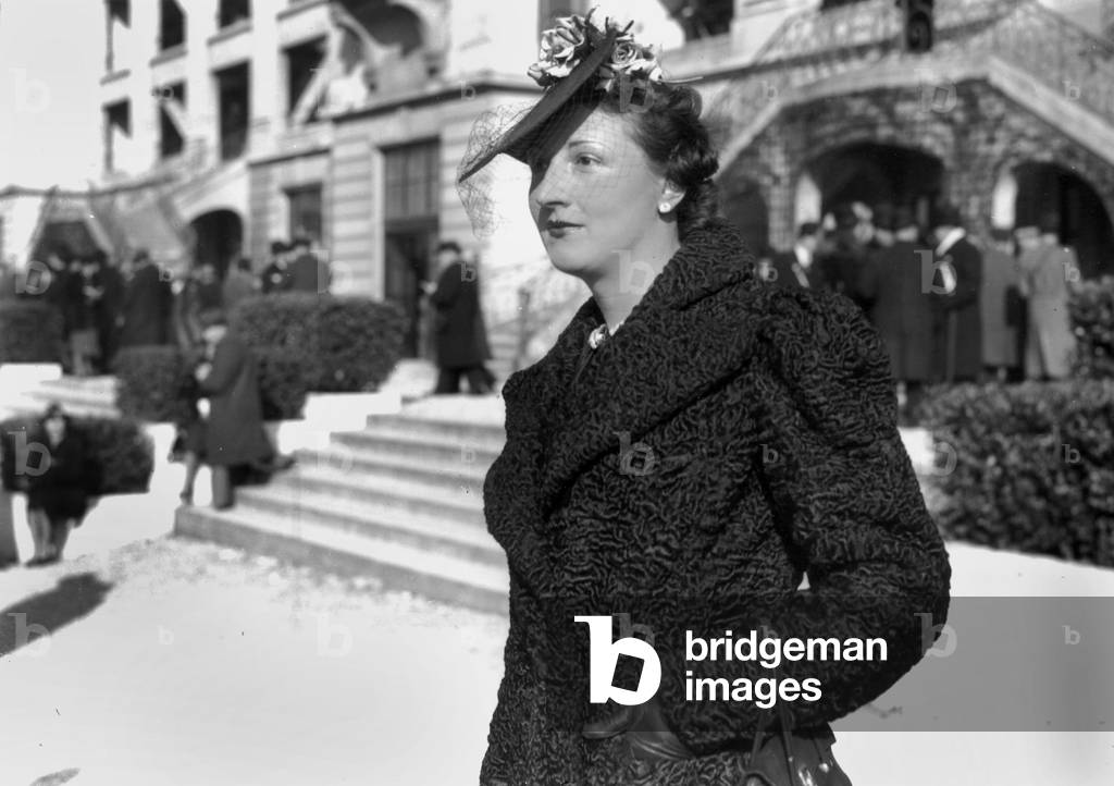 Elegant Woman Wearing An Astrakhan Coat and A Hat, 1938-1939 (b/w photo)