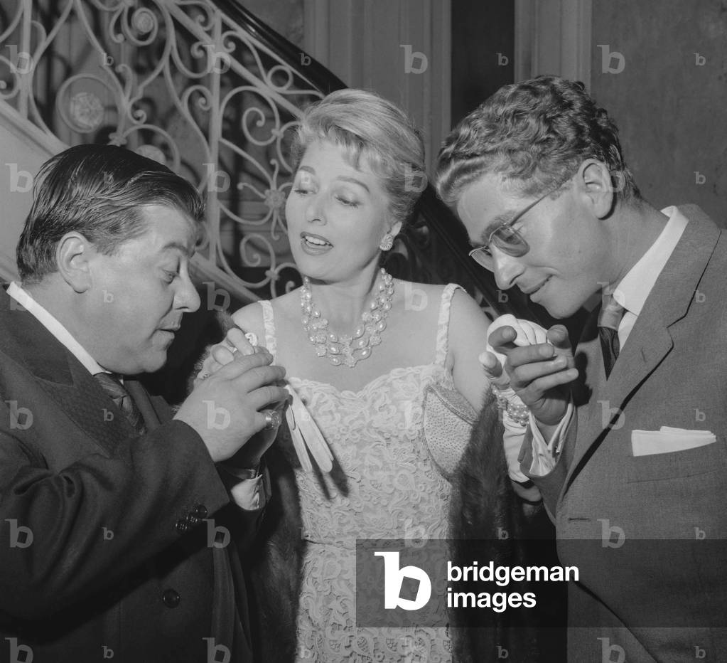 Francis Blanche, Simone Renant and Darry Cowl durin cocktail for premiere of film 