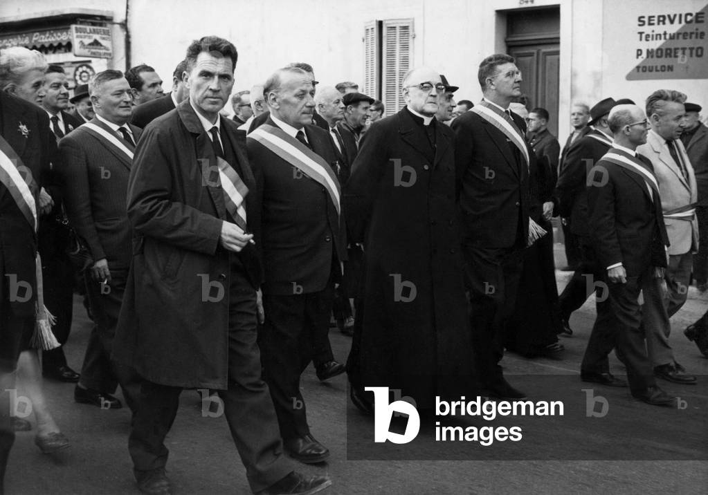 Demonstration Against Dismissals and for Continuing Work in the Head of the Cortege Bishop Barthe L Eveque De Toulon February 9, 1966 (b/w photo)