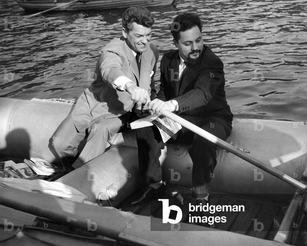 Jean Marais and Alain Bombard on The Raft Rubber (After The Crossing) on May 4, 1953 (b/w photo)