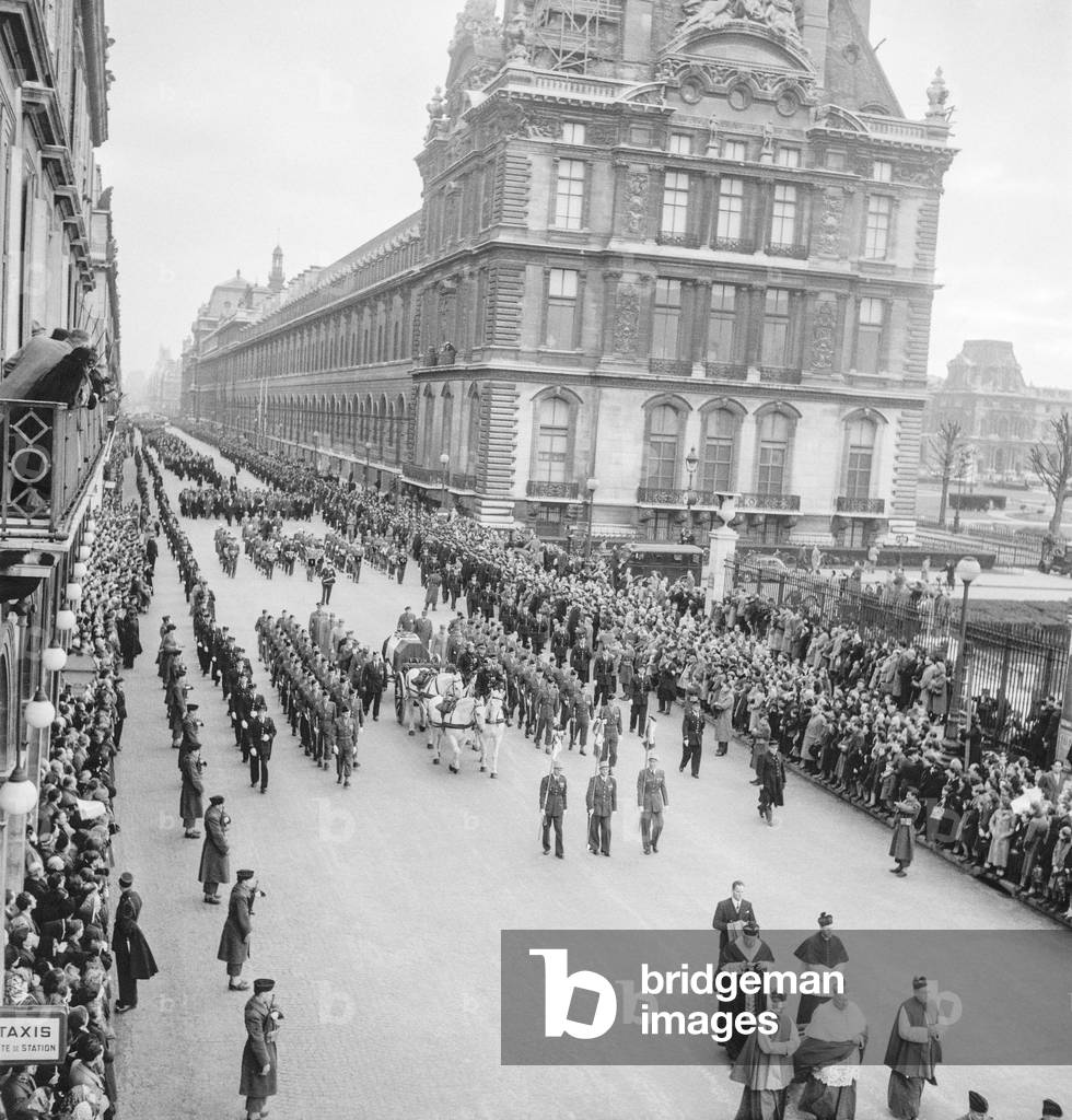 Funeral of French Marshal Jean de Lattre de Tassigny in Paris on January 15, 1952 : the procession in the rue de Rivoli (b/w photo)